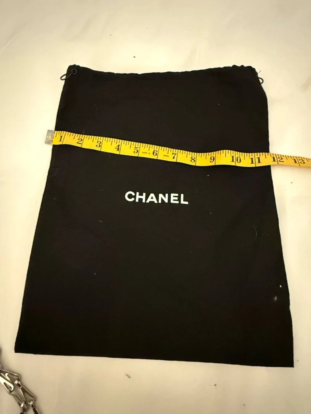CHANEL Black Drawstring Pouch White Logo
